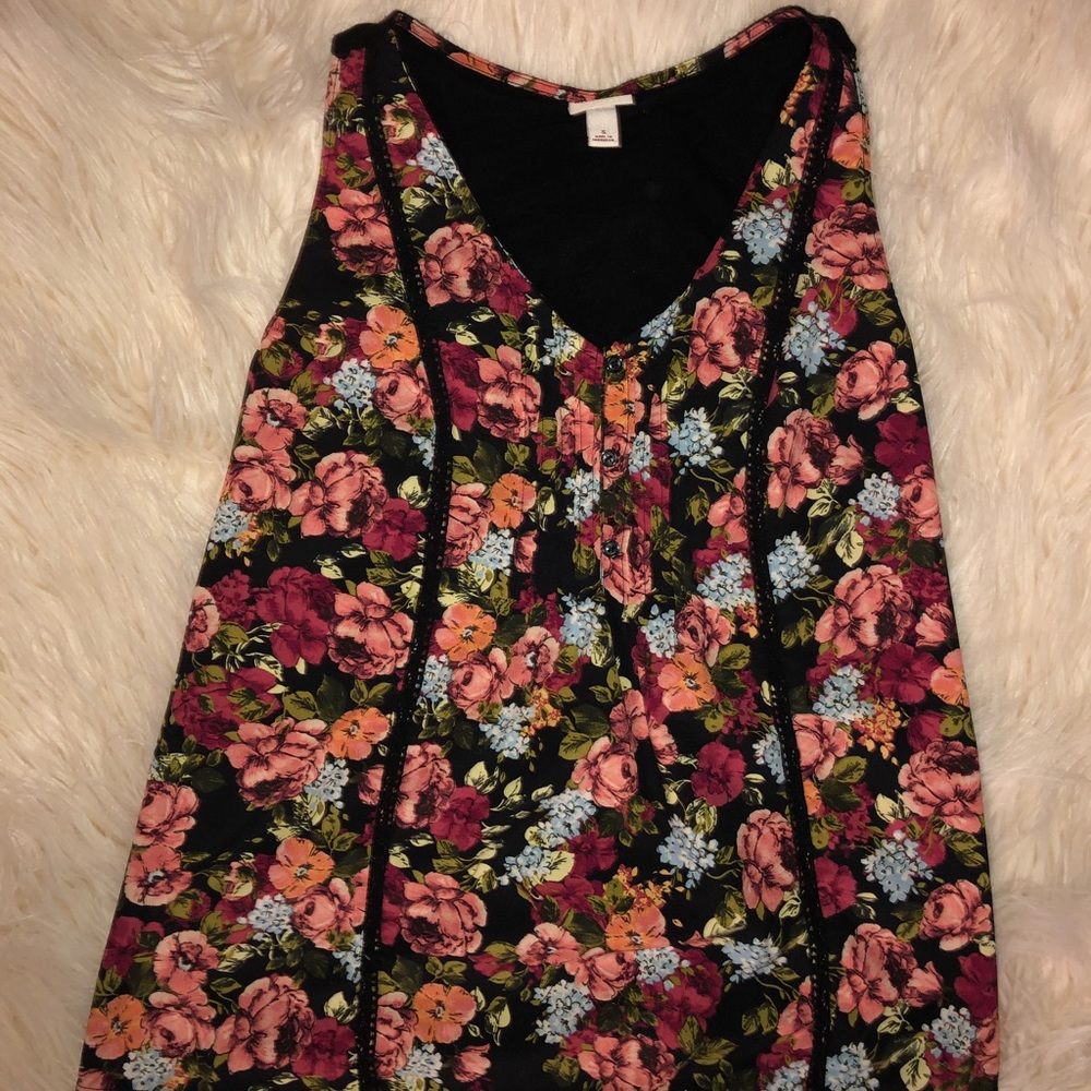 A black and rainbow floral tank style top.